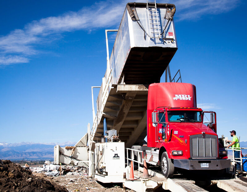 Photo of landfill tipper truck.